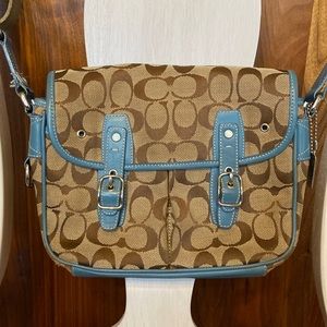 Gently used Coach crossbody or shoulder bag.